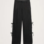 Black wide-leg cropped pants with side tie-front details, shown flat against a light gray background.